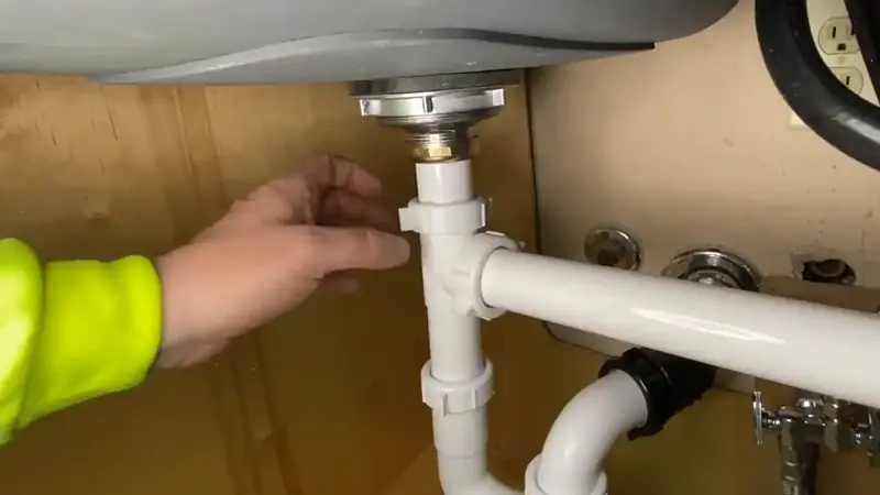 Under-sink leak detection in Beaverton Oregon home, supply connection and drain inspection