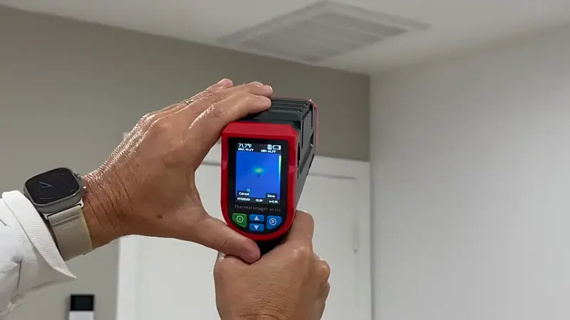 Thermal imaging camera mapping moisture in Beaverton Oregon wall from hidden leak