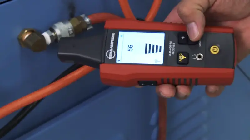 Ultrasonic leak detection sensor on Beaverton Oregon floor for buried pipe assessment